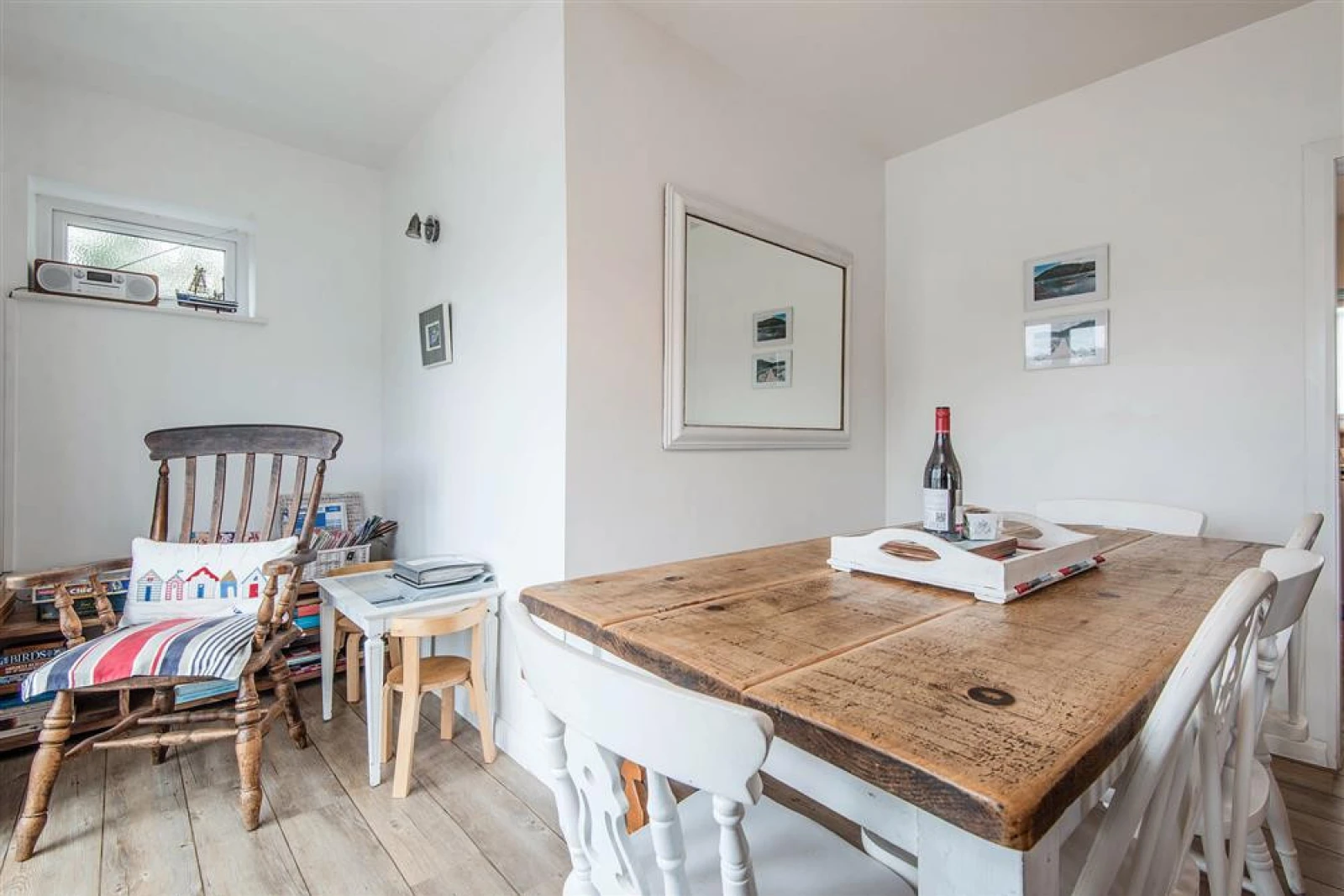 The dining area, with doors to the balcony