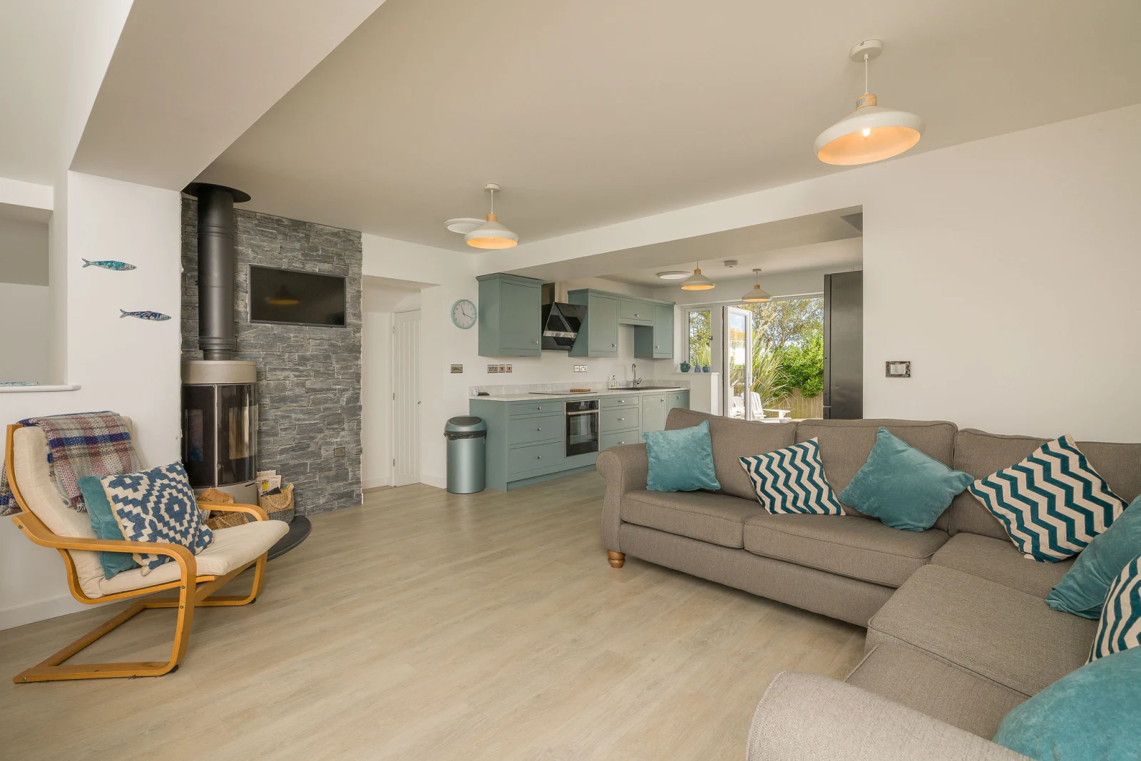 The very attractive lounge with log burner