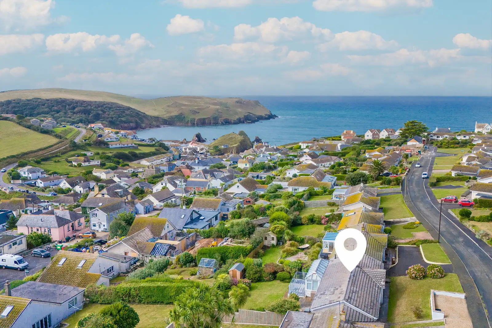 An aerial view of Spindrift and its location - in the village of Hope Cove, just a short walk to the beaches and restaurants.
