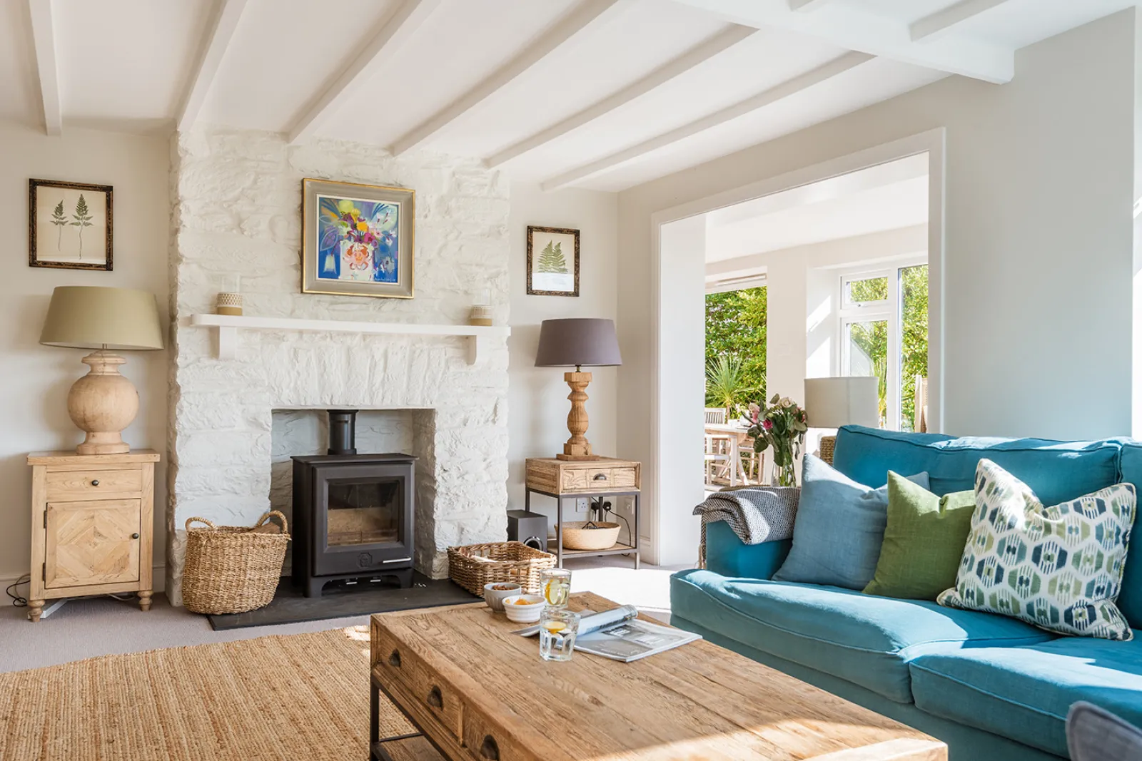 The lounge complete with log burner 