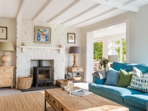 The lounge complete with log burner 