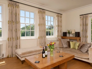 Plenty of sofas and occasional furniture in the pretty lounge room.