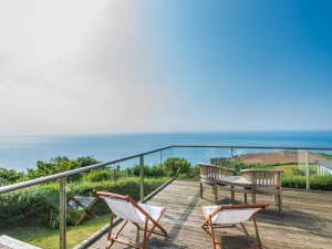 Relax and enjoy sea views from Horizons, a 4 bedroom holiday home in coastal South Devon.