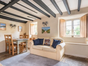 The pretty lounge with dining table