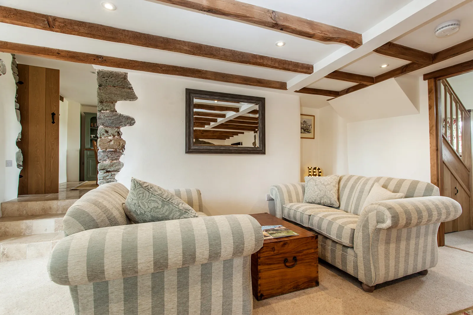 Two comfortable 2 seater sofas' in the adjoining seating area.