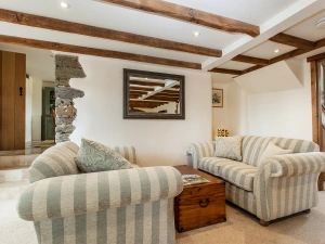Two comfortable 2 seater sofas' in the adjoining seating area.