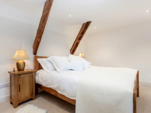 The commodious master room with en-suite bathroom.