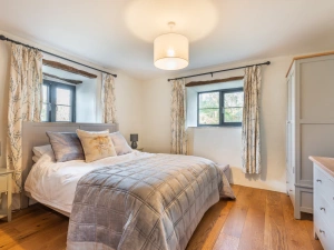 Ligh bedroom with king bed