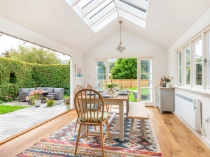 The lovely conservatory leading out to the pretty garden.