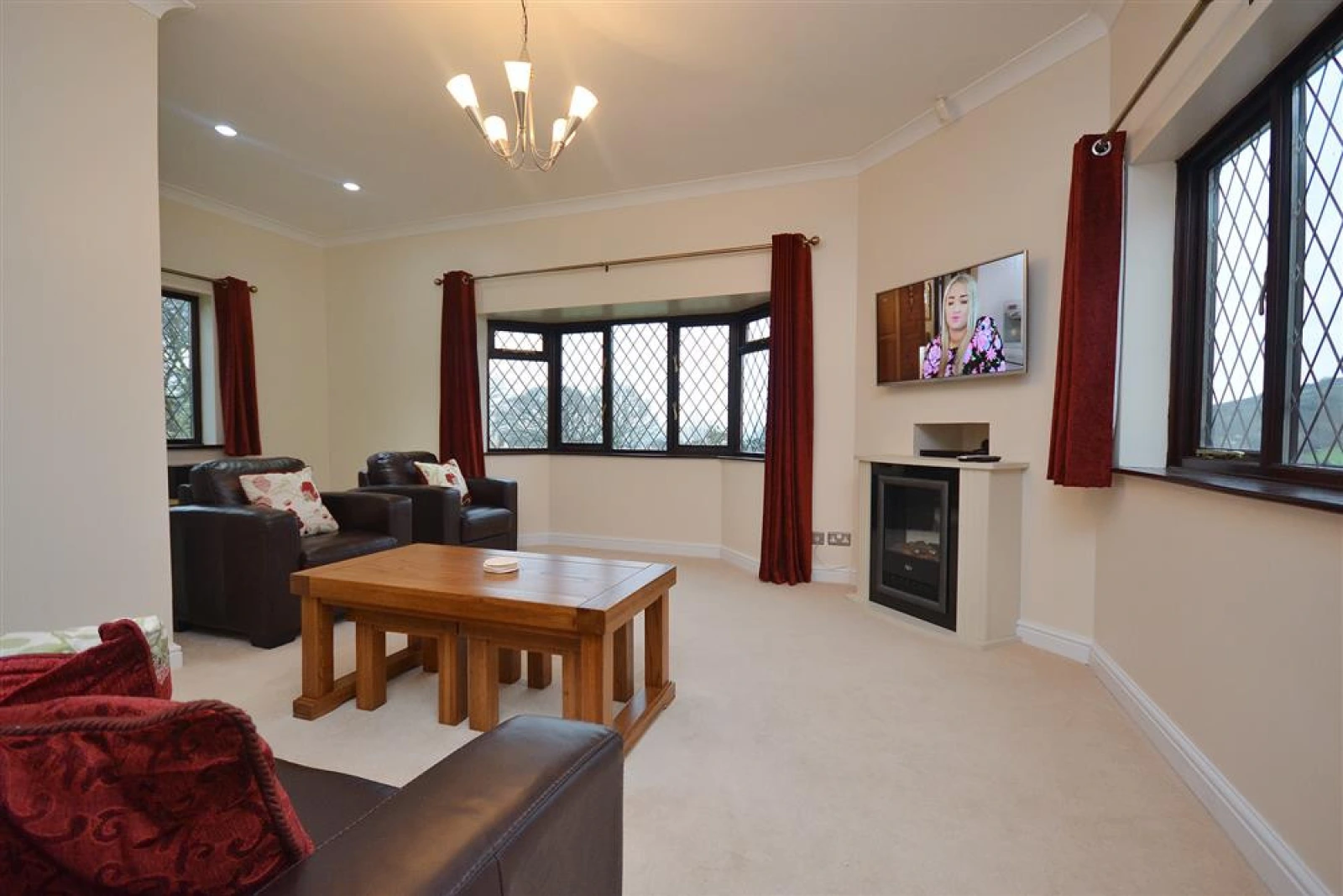 The generous living room with triple aspects