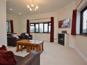 The generous living room with triple aspects