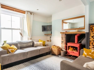With a cosy log burner, and some outside space this cottage is perfect for relaxing breaks all year round.