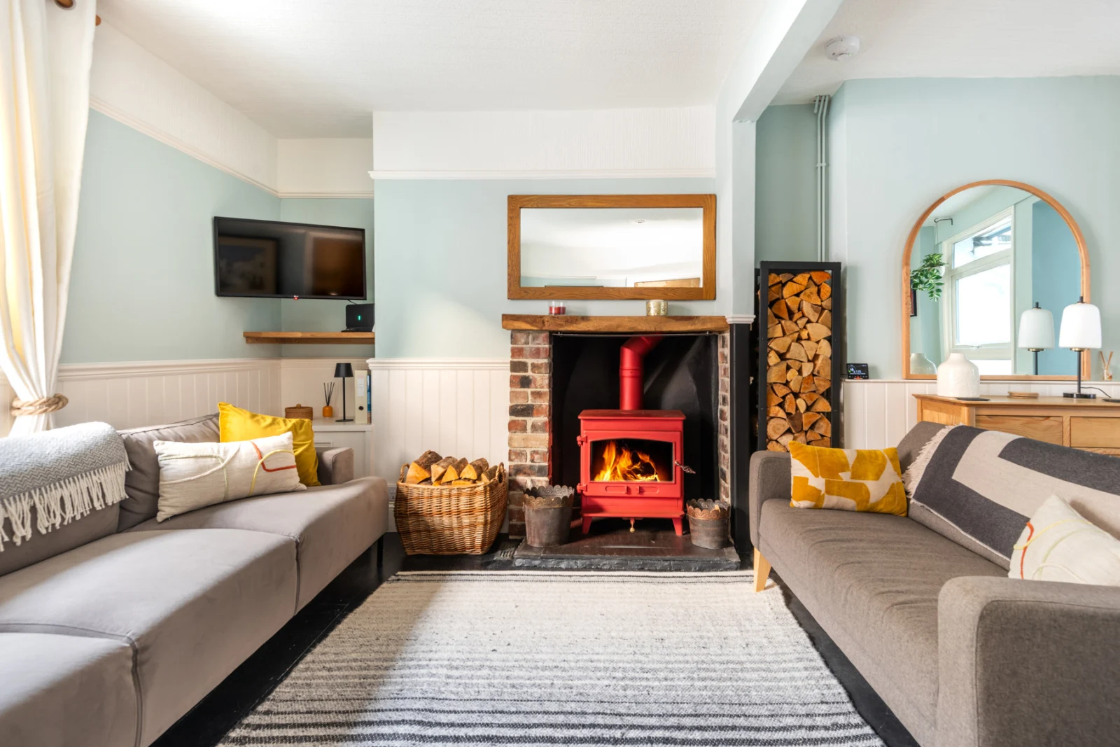 Relax with the log burner roaring away after a busy day exploring South Devon