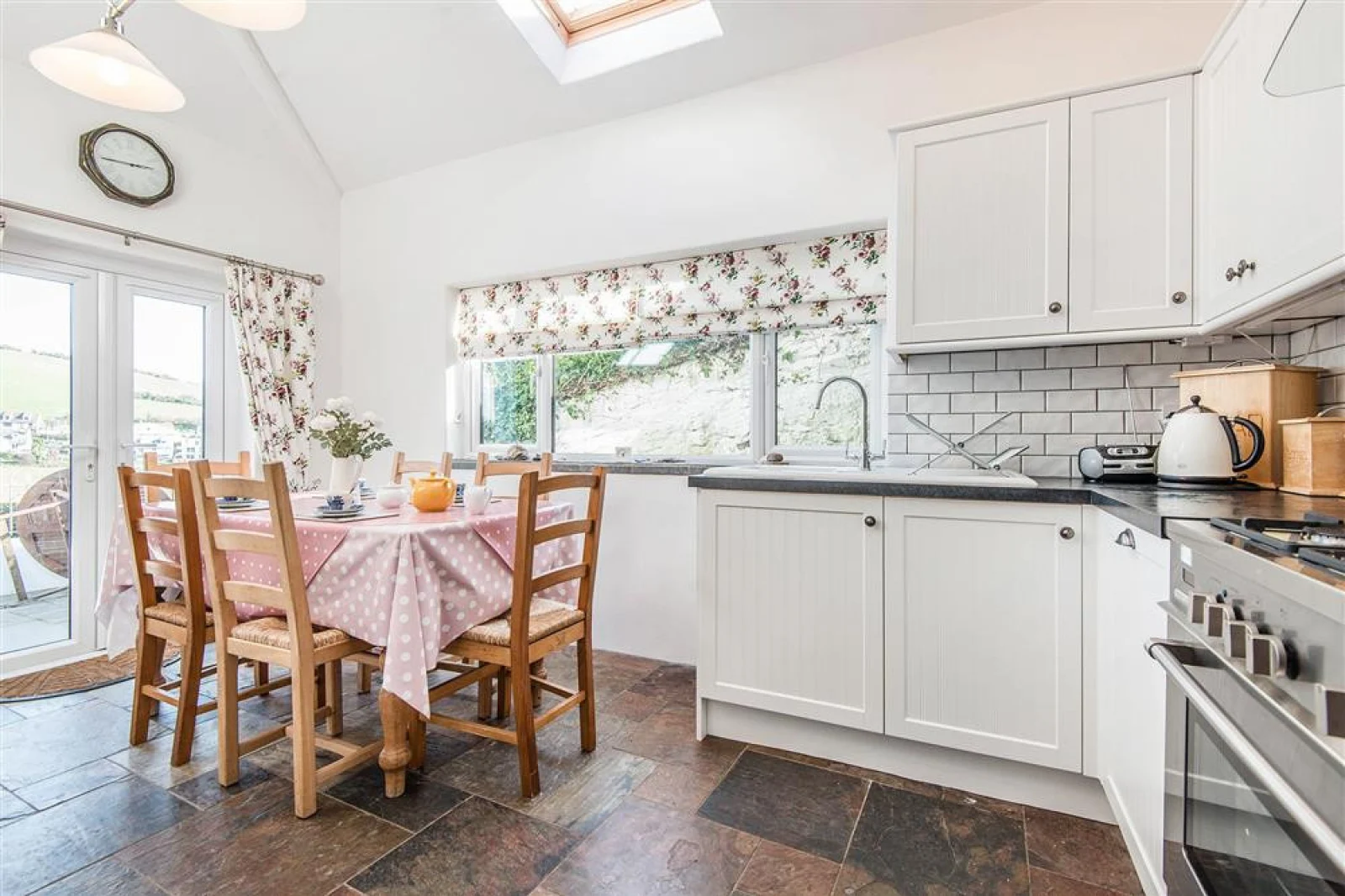 The modern kitchen and dining area