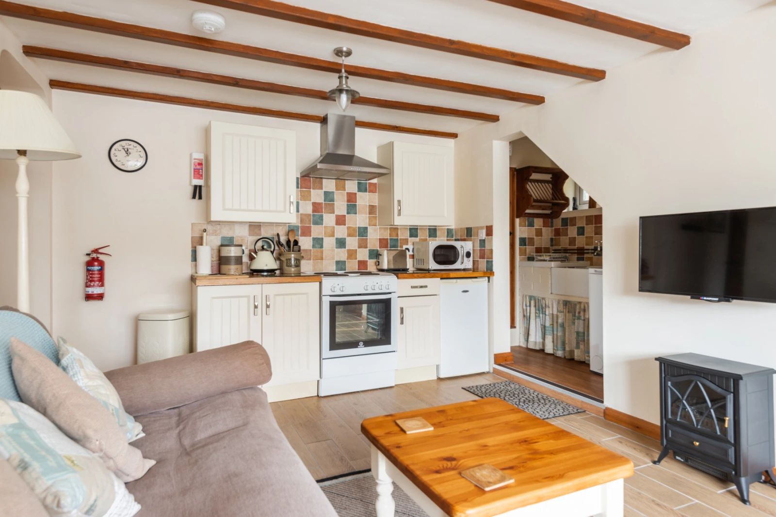 Living Space, seating, well equipped kitchen