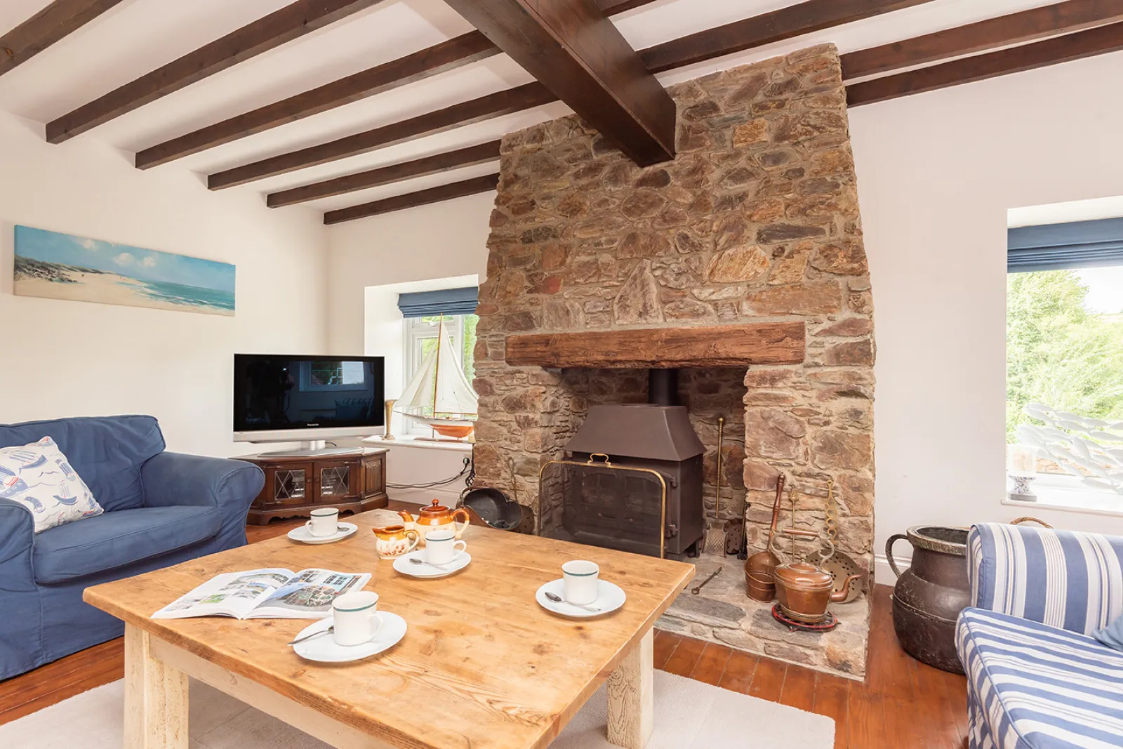 Another view of the lounge with log burner