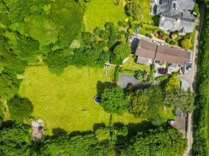 Surrounded by scenic countryside with its own 1 acre paddock and a play area