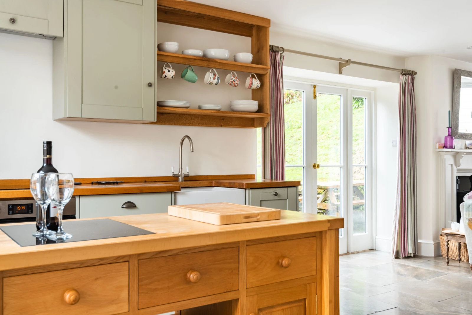 Open plan kitchen with patio doors