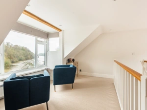 The cosy seating area within the top floor double bedroom