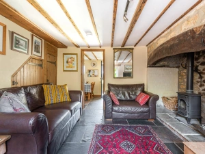 Lounge area with Smart TV and wood burner