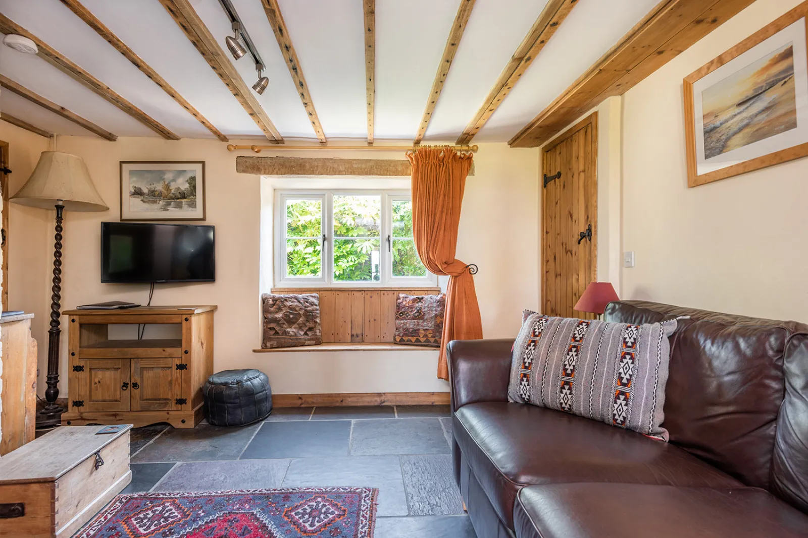 Lounge area with Smart TV and wood burner