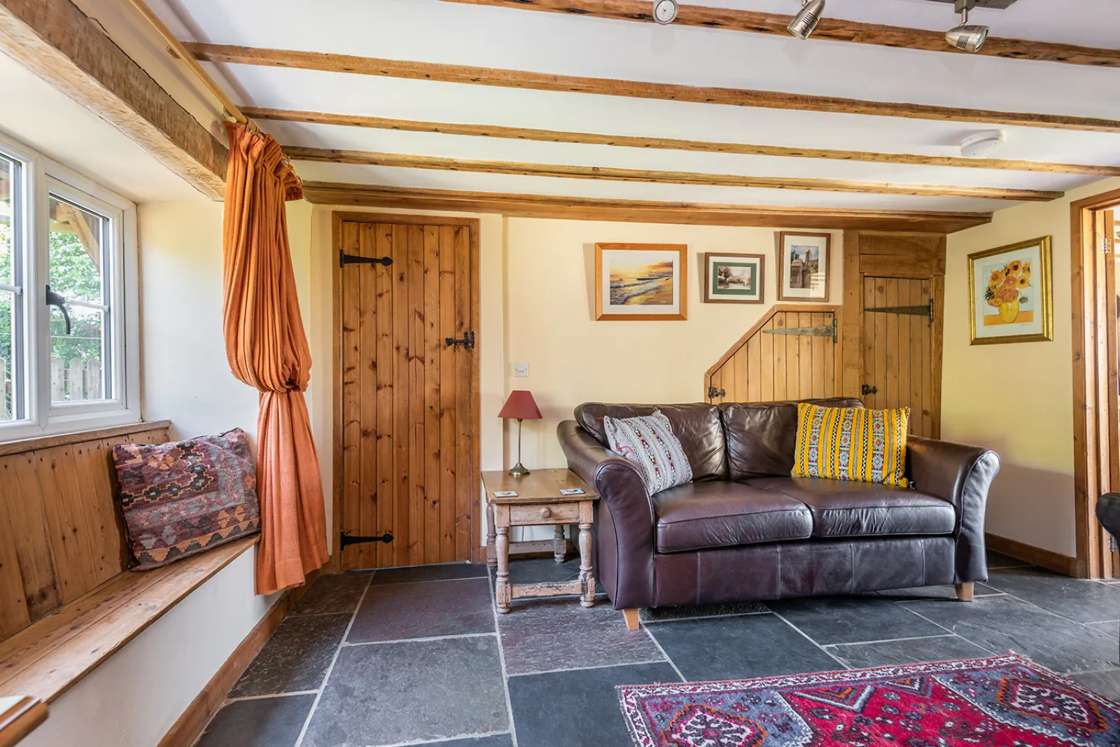 Lounge area with Smart TV and wood burner