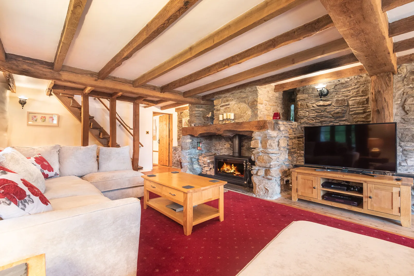 The lounge with modern wood burning stove
