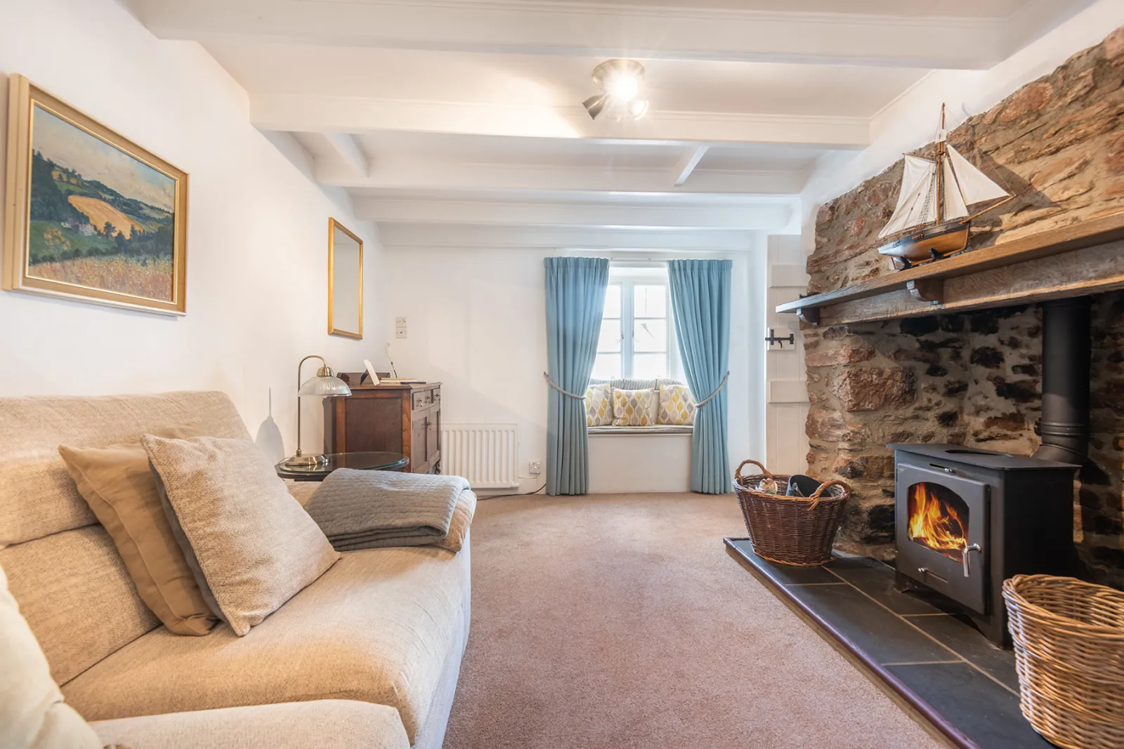 The lovely wood-burner in the lounge, cosy in the winter. 