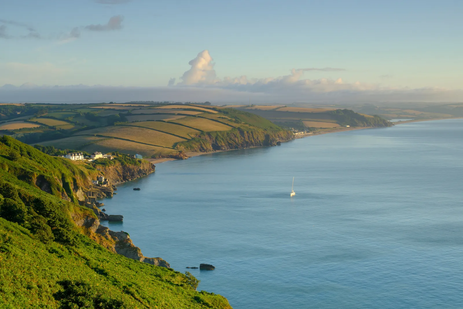 sunrise over Start Bay from the South West Coast Path