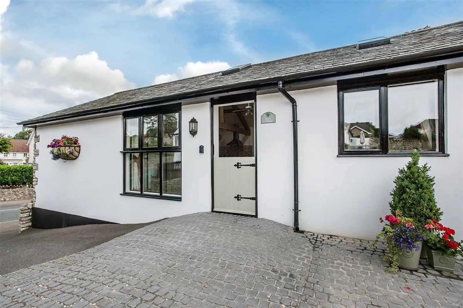Rose Cottage, located in the pretty village of Colyford