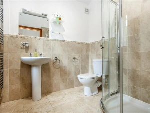 The en-suite with power shower and under floor heating