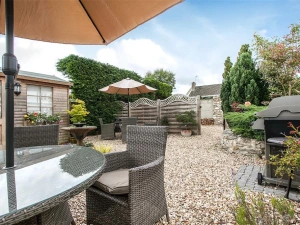 Garden furniture and barbecue provided for guests