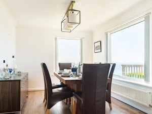 Dining room with light flooding in 