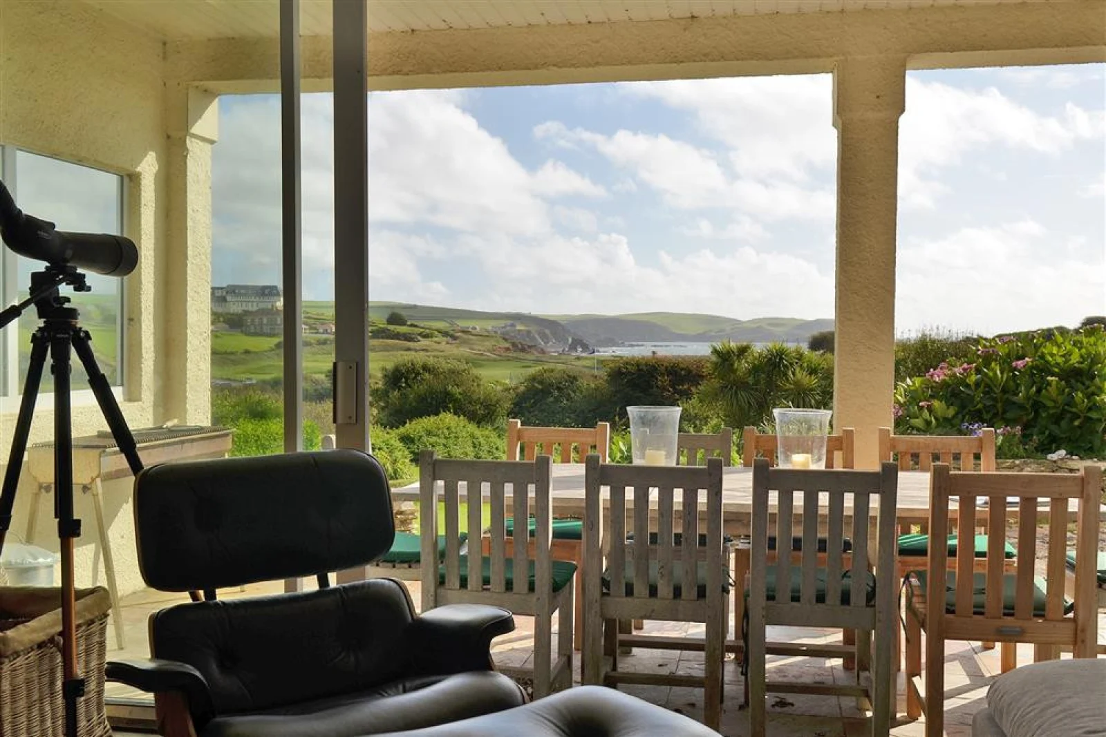 Bringing the outside in with floor to ceiling glazed door to the covered terrace
