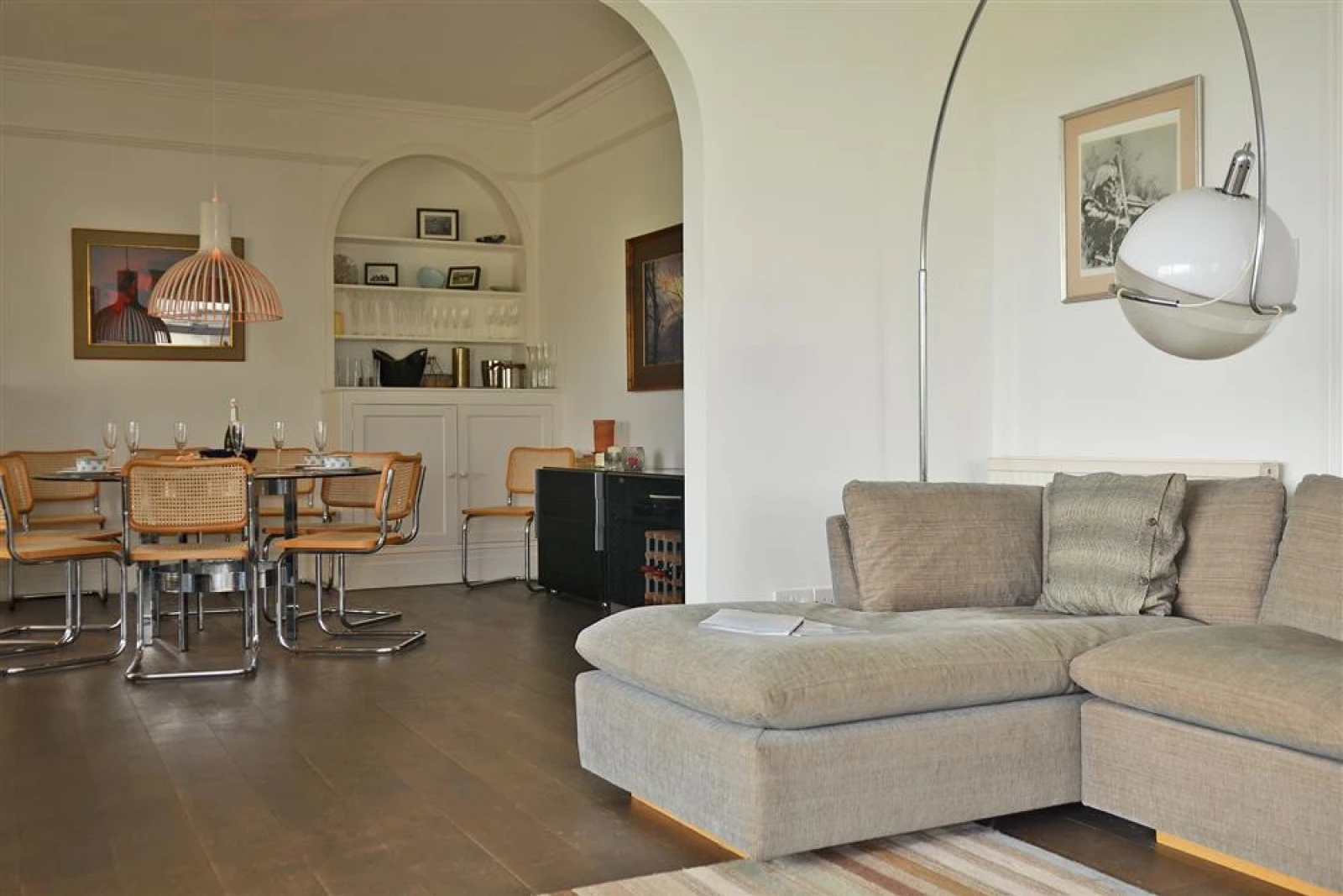 The lounge area leads to the dining room