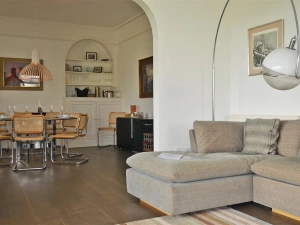 The lounge area leads to the dining room