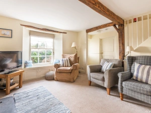 The porch leads into a lovely lounge room.