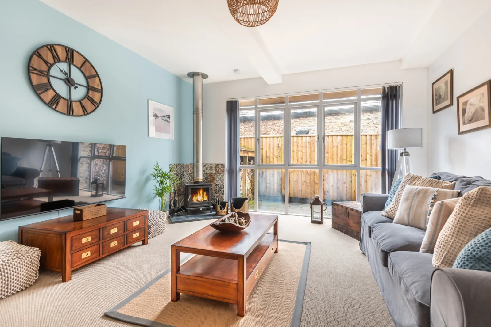 Sumptuous sofas and warm wood-burning stove! 