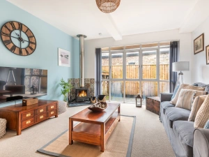 Sumptuous sofas and warm wood-burning stove! 