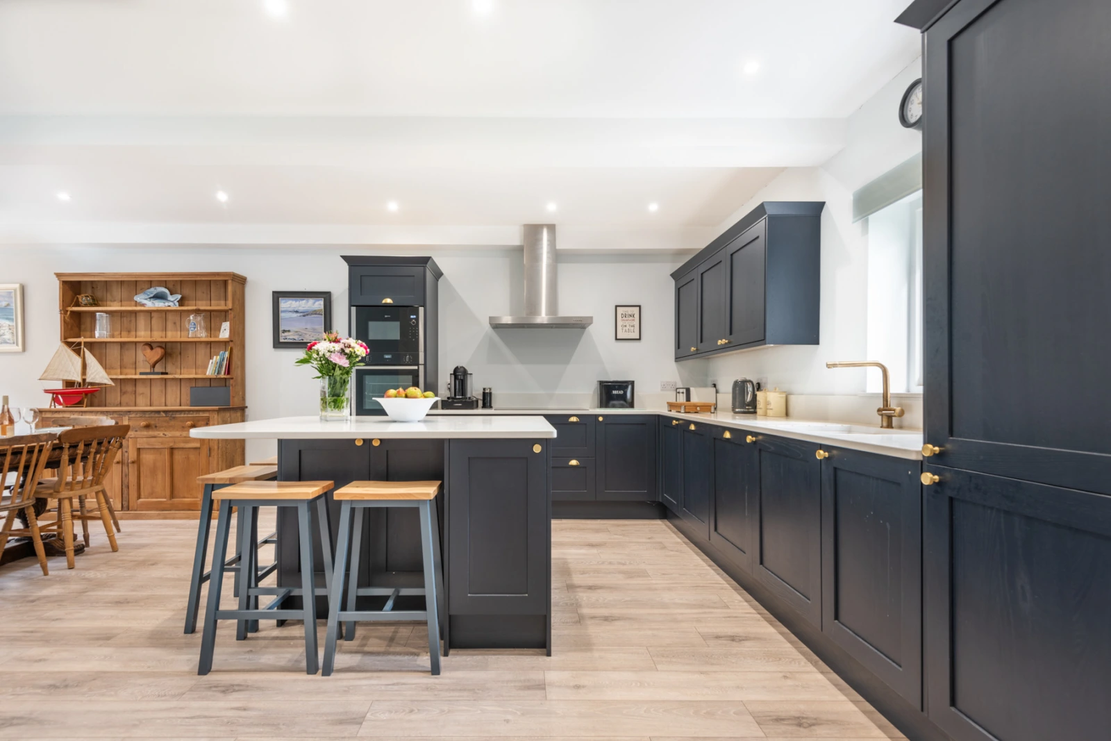 A wonderful open plan kitchen diner - the perfect place to come together after a busy day exploring! 