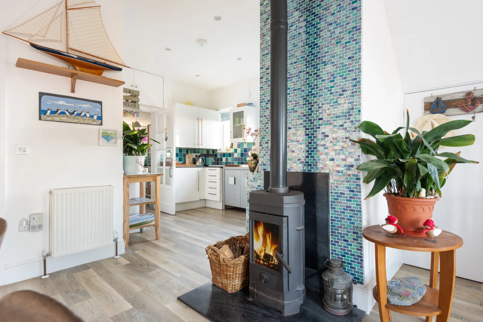 The ground floor with log burner, kitchen diner and bedrooms