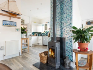 The ground floor with log burner, kitchen diner and bedrooms