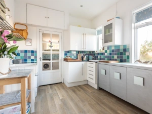 Another view of the kitchen, with the door through to the utility