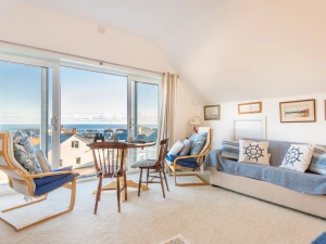 The first floor lounge with views across the ley and out to sea.