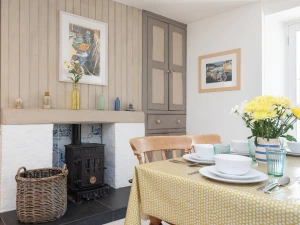 Dining end with electric wood stove