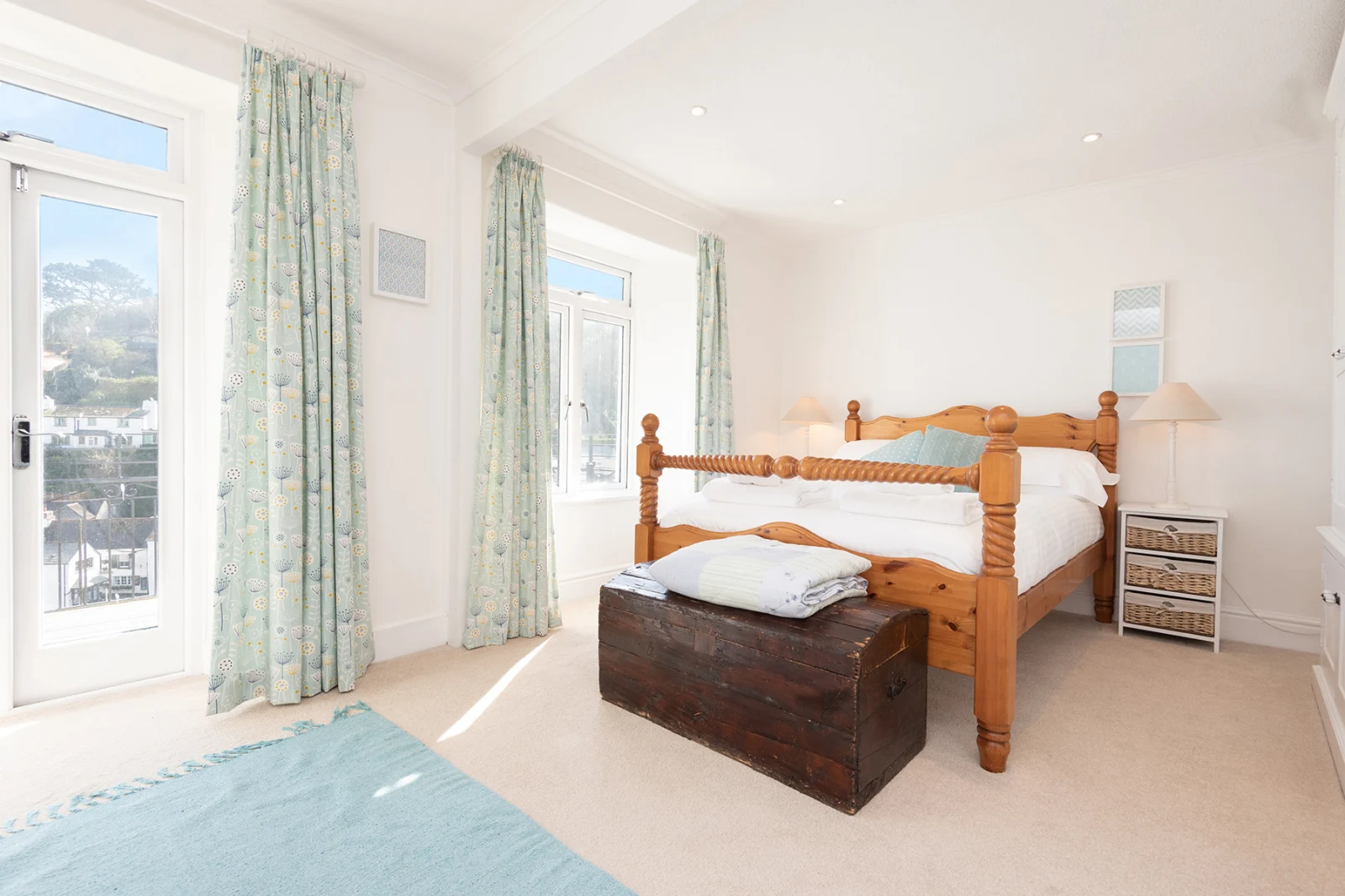 The master bedroom with the French windows onto the balcony