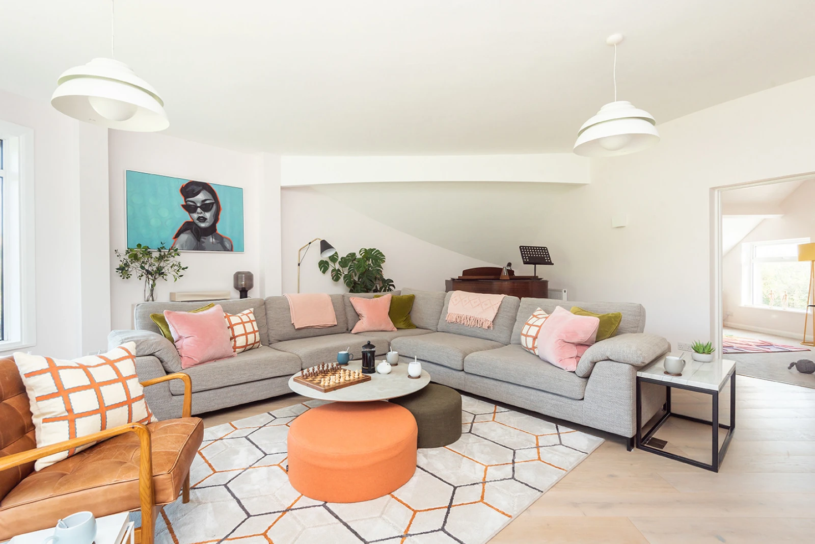 The comfortable living room with 'L' shape sofa
