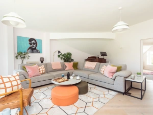 The comfortable living room with 'L' shape sofa
