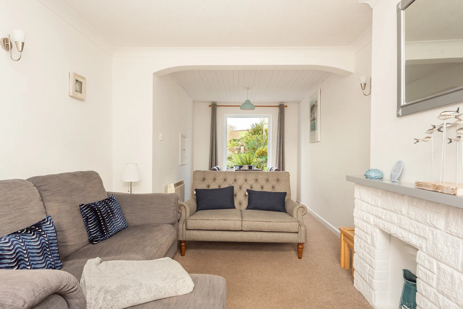 The comfortable lounge in this 3 bed holiday home in Chillington, Devon
