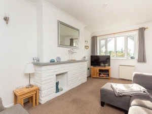 Light and airy lounge area looks out on to the quiet residential street in Chillington